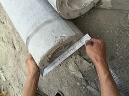 End inclination being measured on a finished circular concrete pole