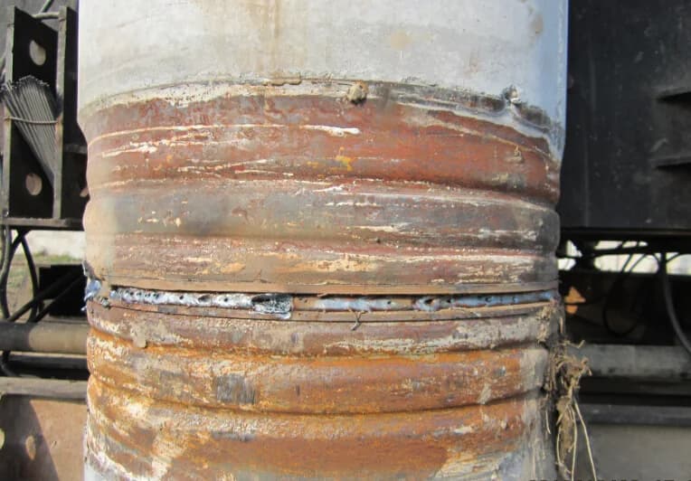 Close field view of a welded end-plate splice between PHC or PC pile segments